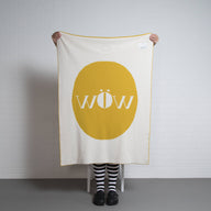 tullibee knitted blanket WOW mustard reverse held up